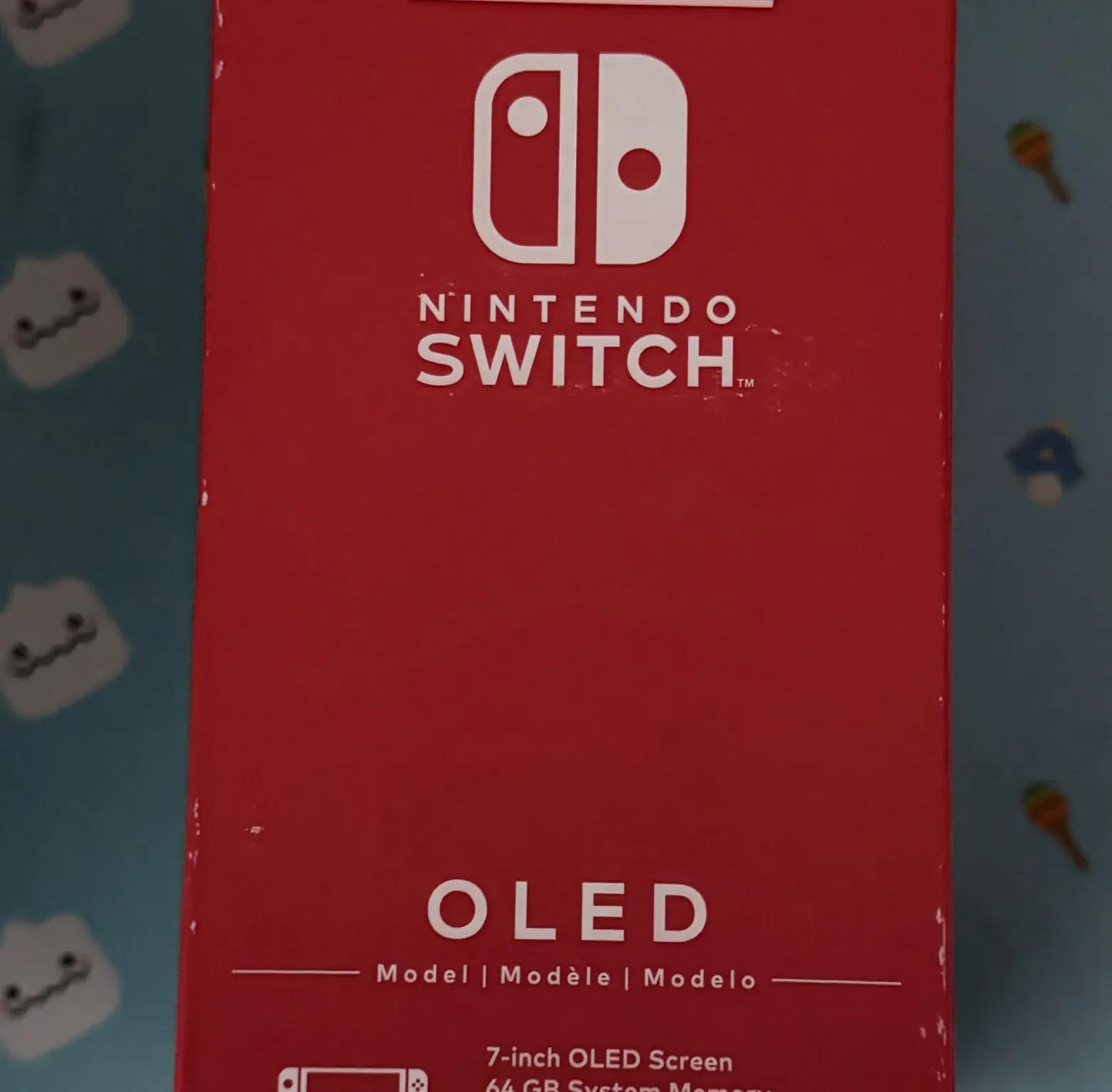 Nintendo Switch – OLED Model w/ Neon Red & Neon Blue Joy-Con