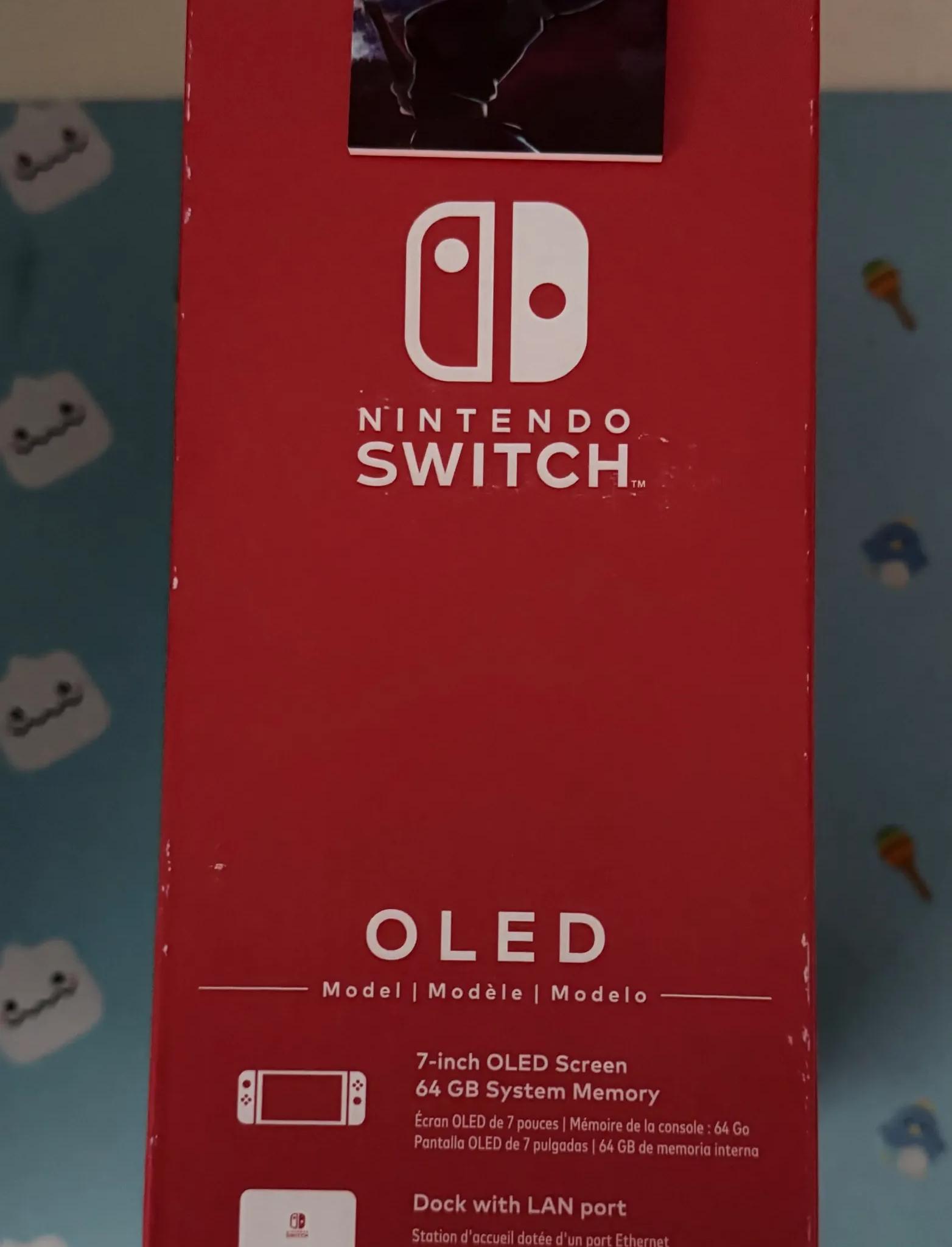 Nintendo Switch – OLED Model w/ Neon Red & Neon Blue Joy-Con