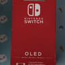Nintendo Switch – OLED Model w/ Neon Red & Neon Blue Joy-Con