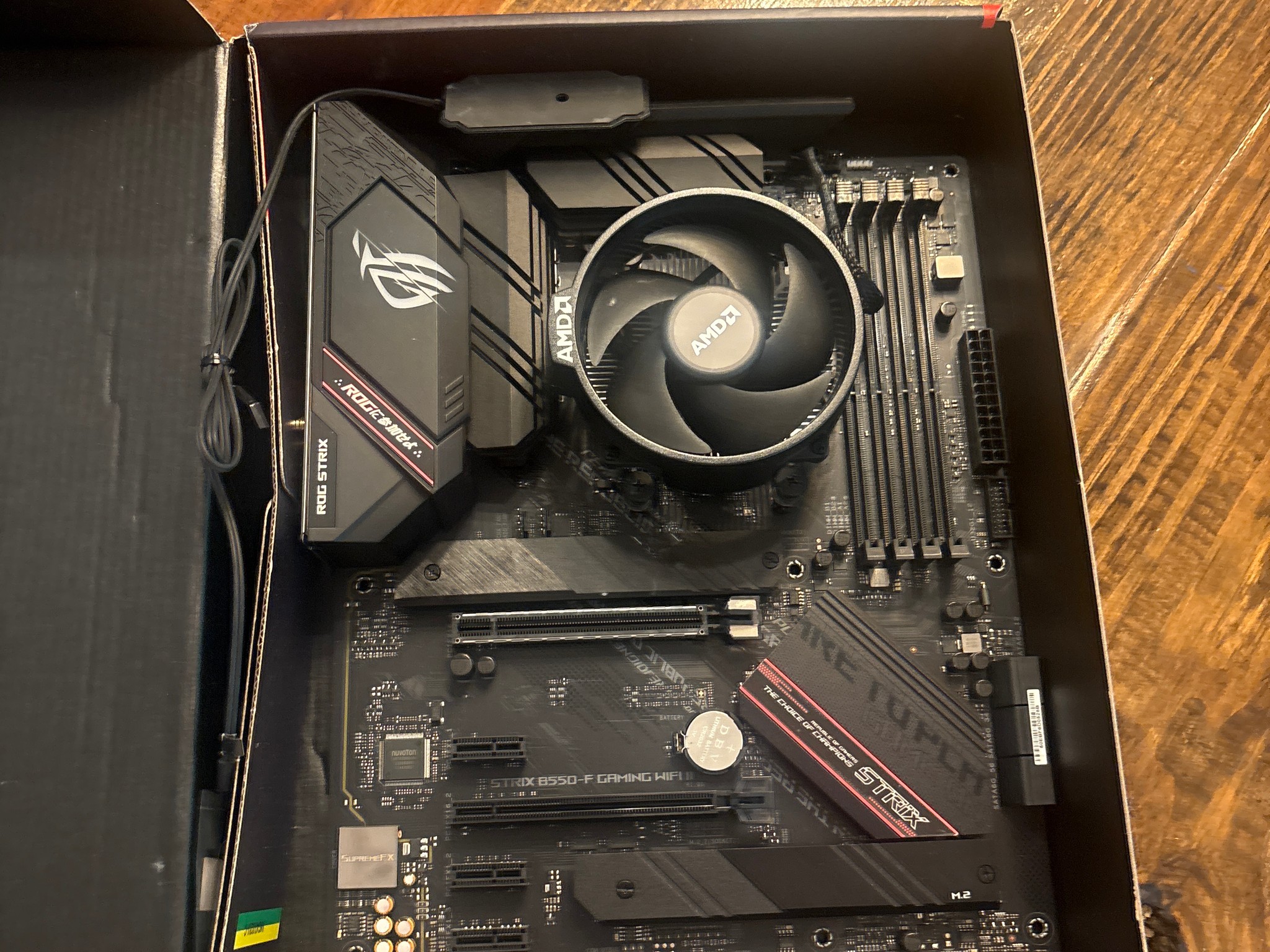 Used but good condition Rog motherboard and Ryzen 5 5500 CPU with stock AMD cooler