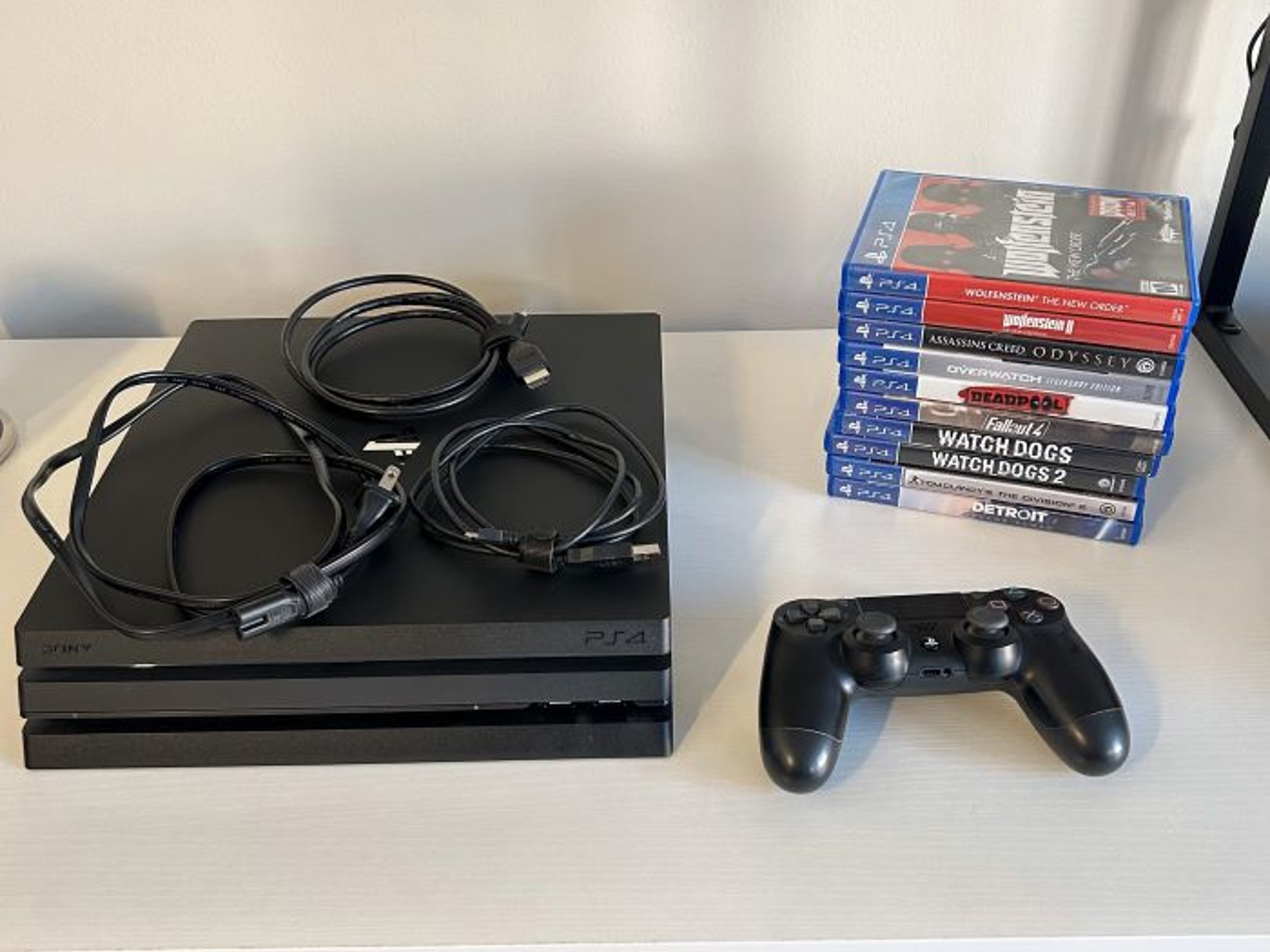 PS4 Pro (1 TB) - 10 Games Included (See Product Description for Titles)