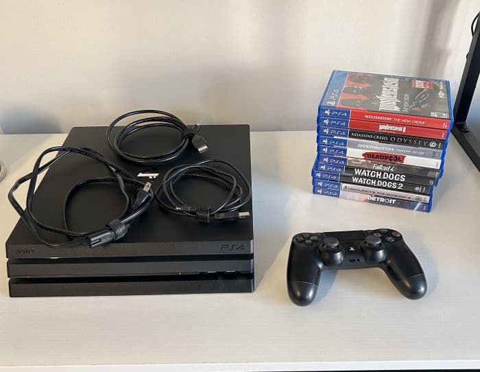 PS4 Pro (1 TB) - 10 Games Included (See Product Description for Titles)