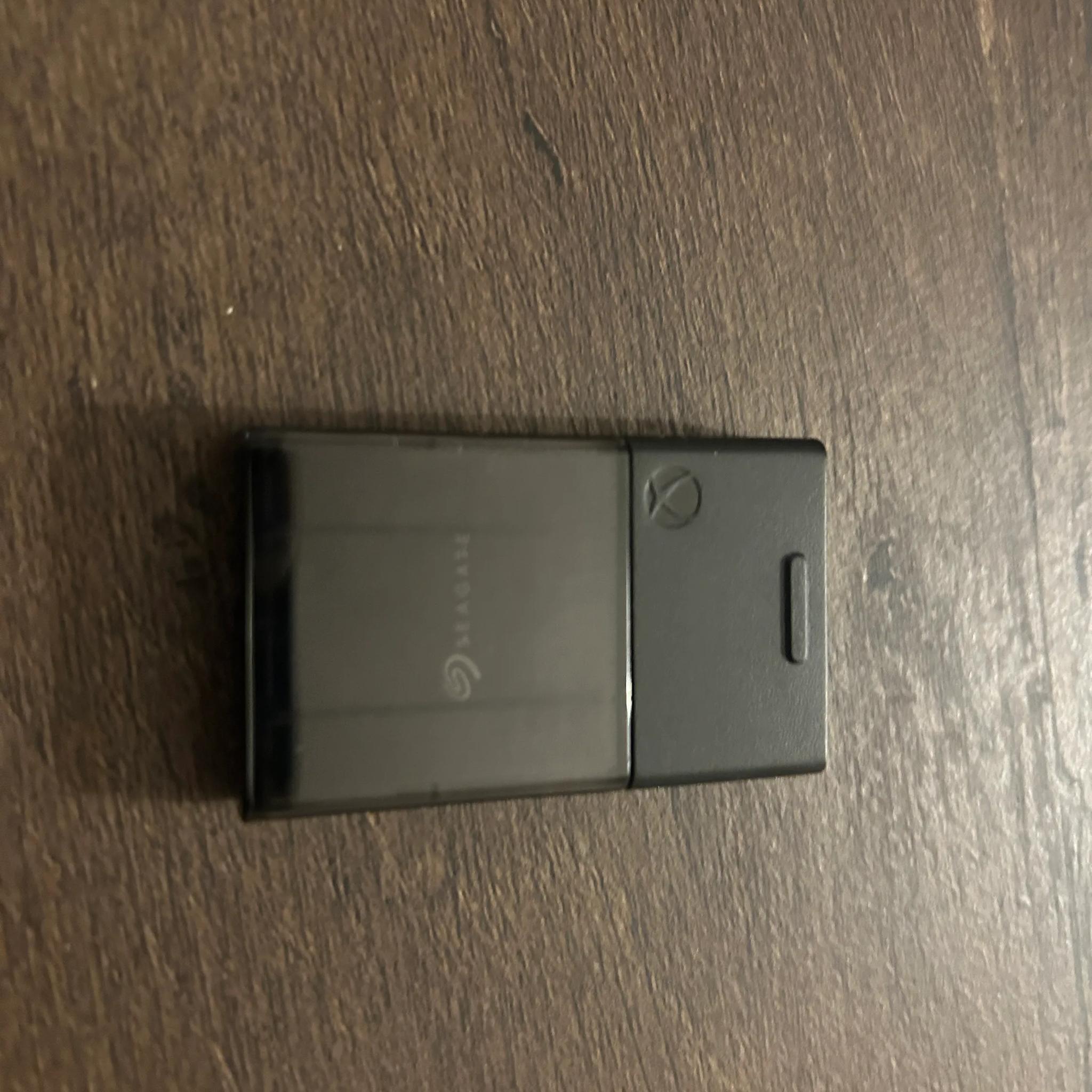 Xbox Series S, Seagate Storage Expansion Card 1TB SSD, 2 Controllers and Charging station.