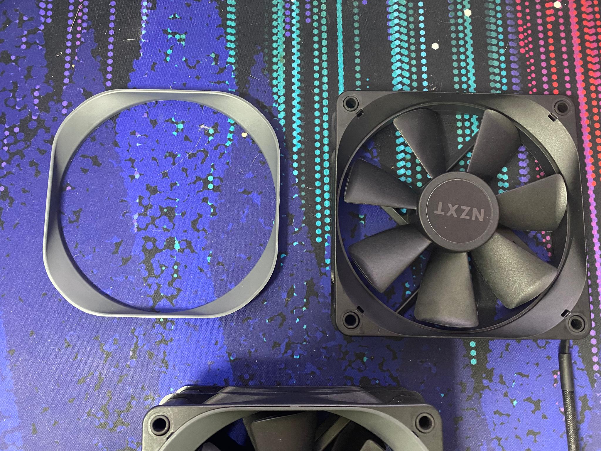 3x NZXT Aer P 120mm FDB 4pin PWM Black fans with removable accent plastic.