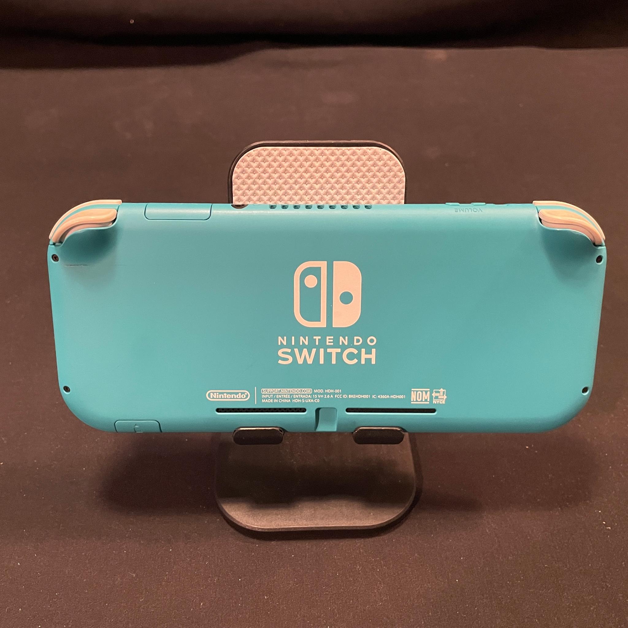 Nintendo Switch Lite Blue With Grip Case And Accessories