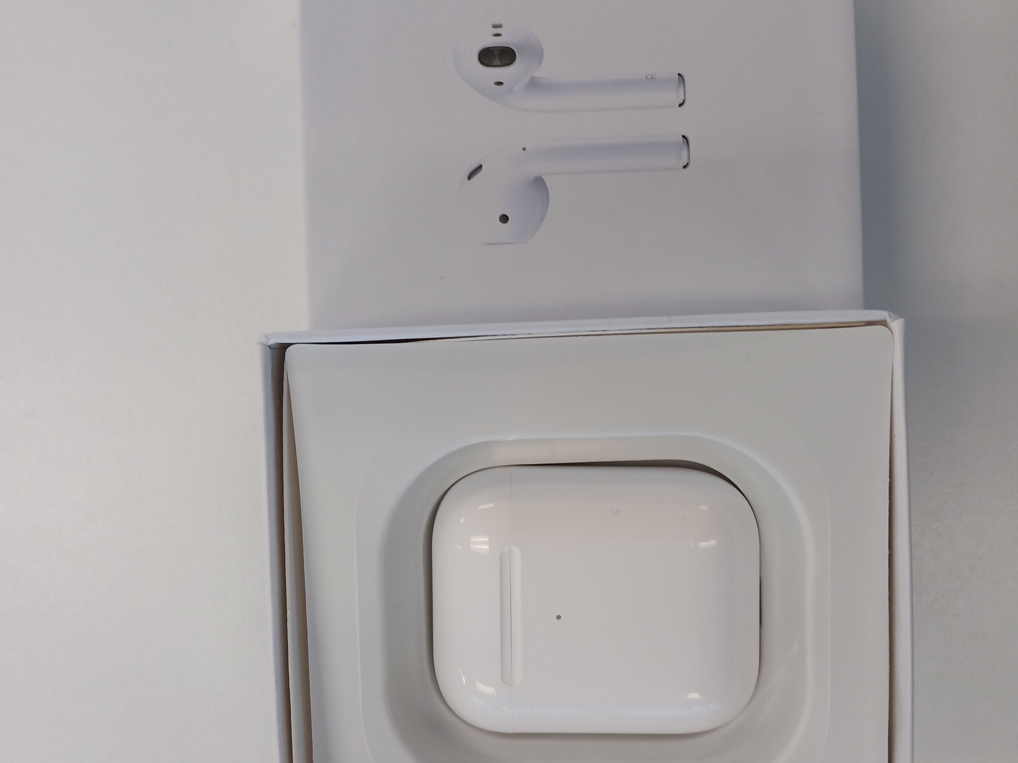 Airpods original packaging, charger and manual