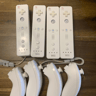 (4) Wii Remotes w/ Nunchuks