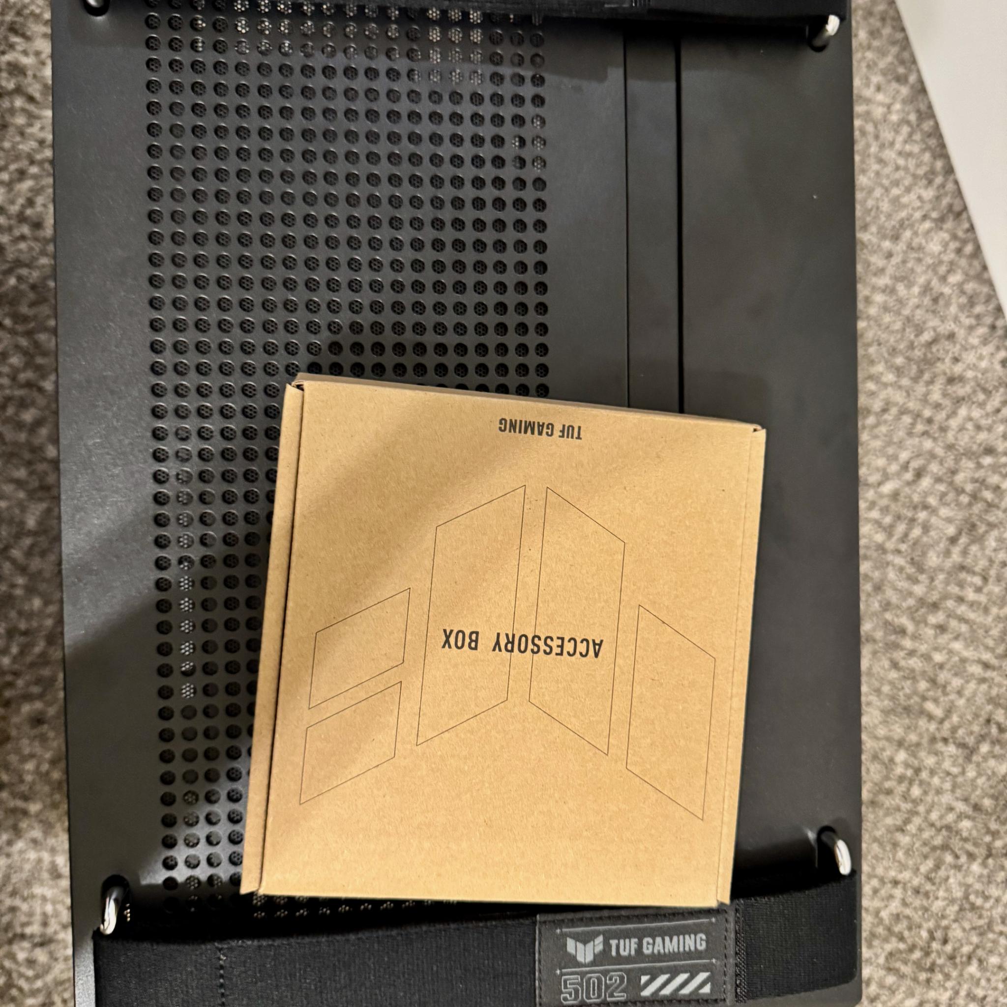 Black - Asus TUF Gaming GT502 in retail packaging.