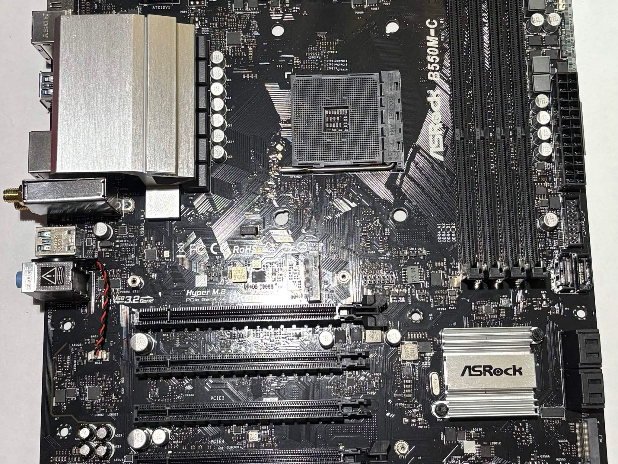 ASRock B550M-C AM4 Motherboard – DDR4 – PCIe 4.0 – Tested Working – I/O Shield Included