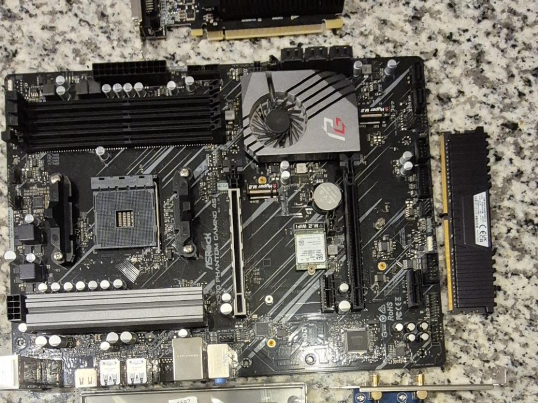 Combo ASRock X570 PHANTOM GAMING 4S AMD ATX AM4 Mobo, 32GB Vegeance LPX RAM, MSI GeForce GT 710 GPU