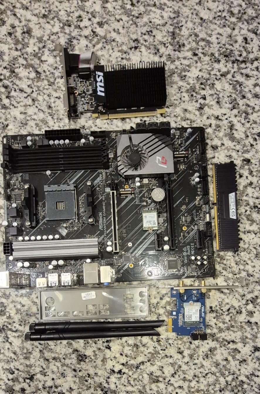 Combo ASRock X570 PHANTOM GAMING 4S AMD ATX AM4 Mobo, 32GB Vegeance LPX RAM, MSI GeForce GT 710 GPU