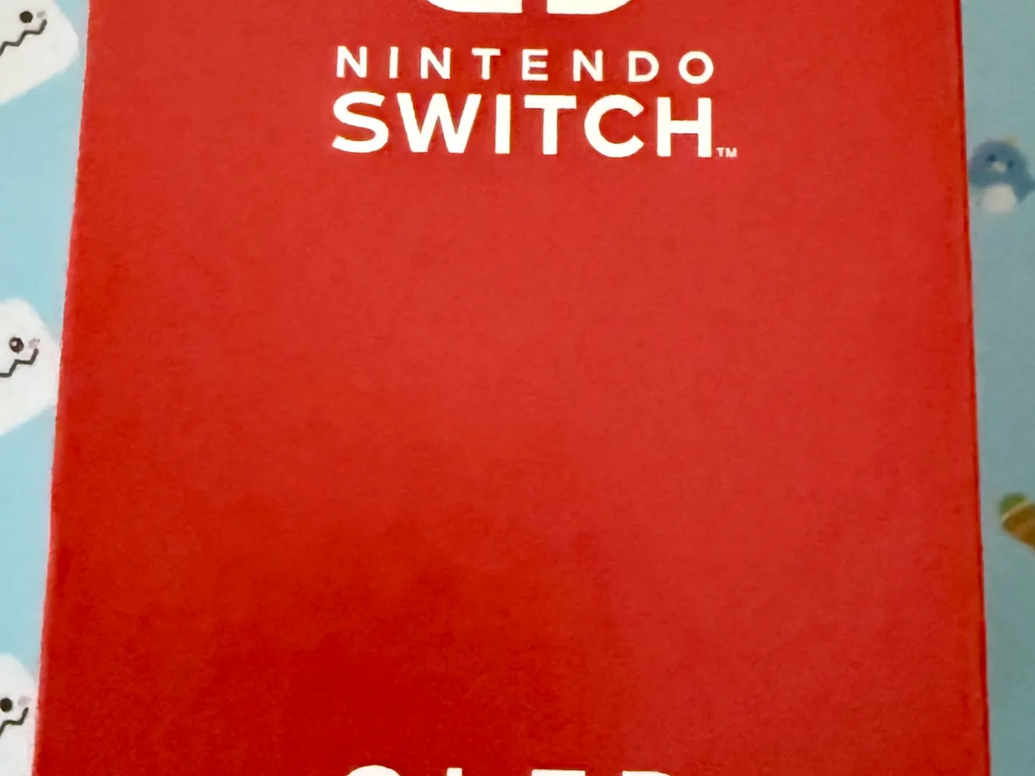 Nintendo Switch – OLED Model w/ White Joy-Con