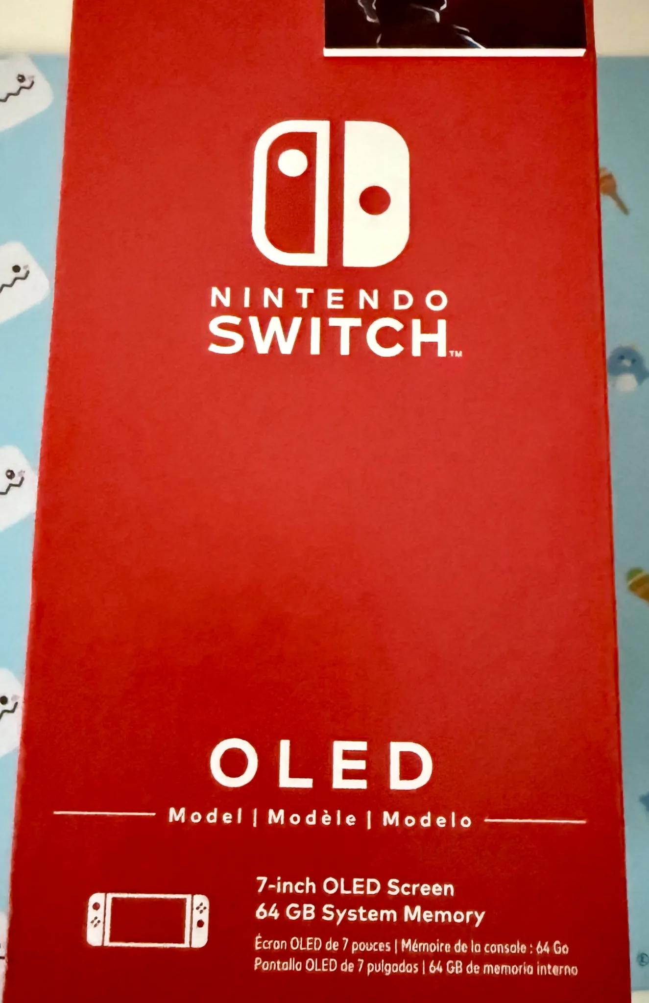 Nintendo Switch – OLED Model w/ White Joy-Con