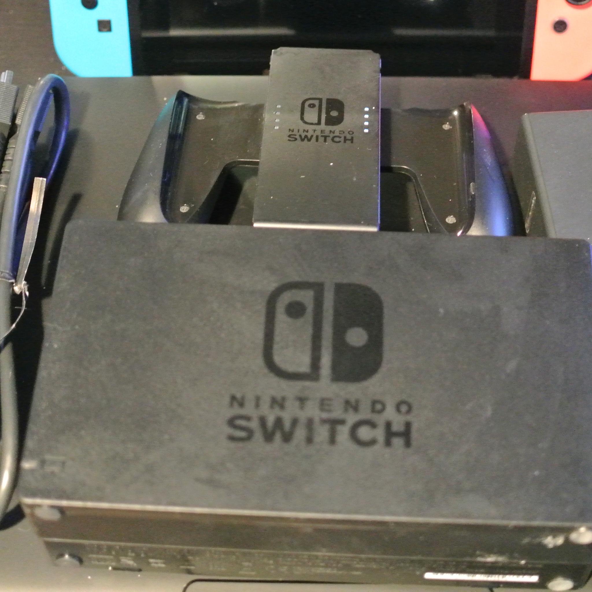Nintendo Switch w/ Dock, Joycons, Grip and Travel Case