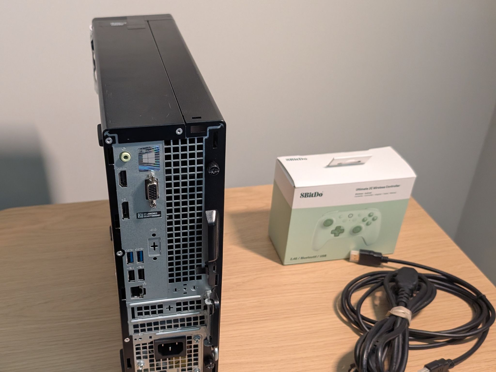 Dell Optiplex with visible damage, refurbished as a cheap steam box running bazzite