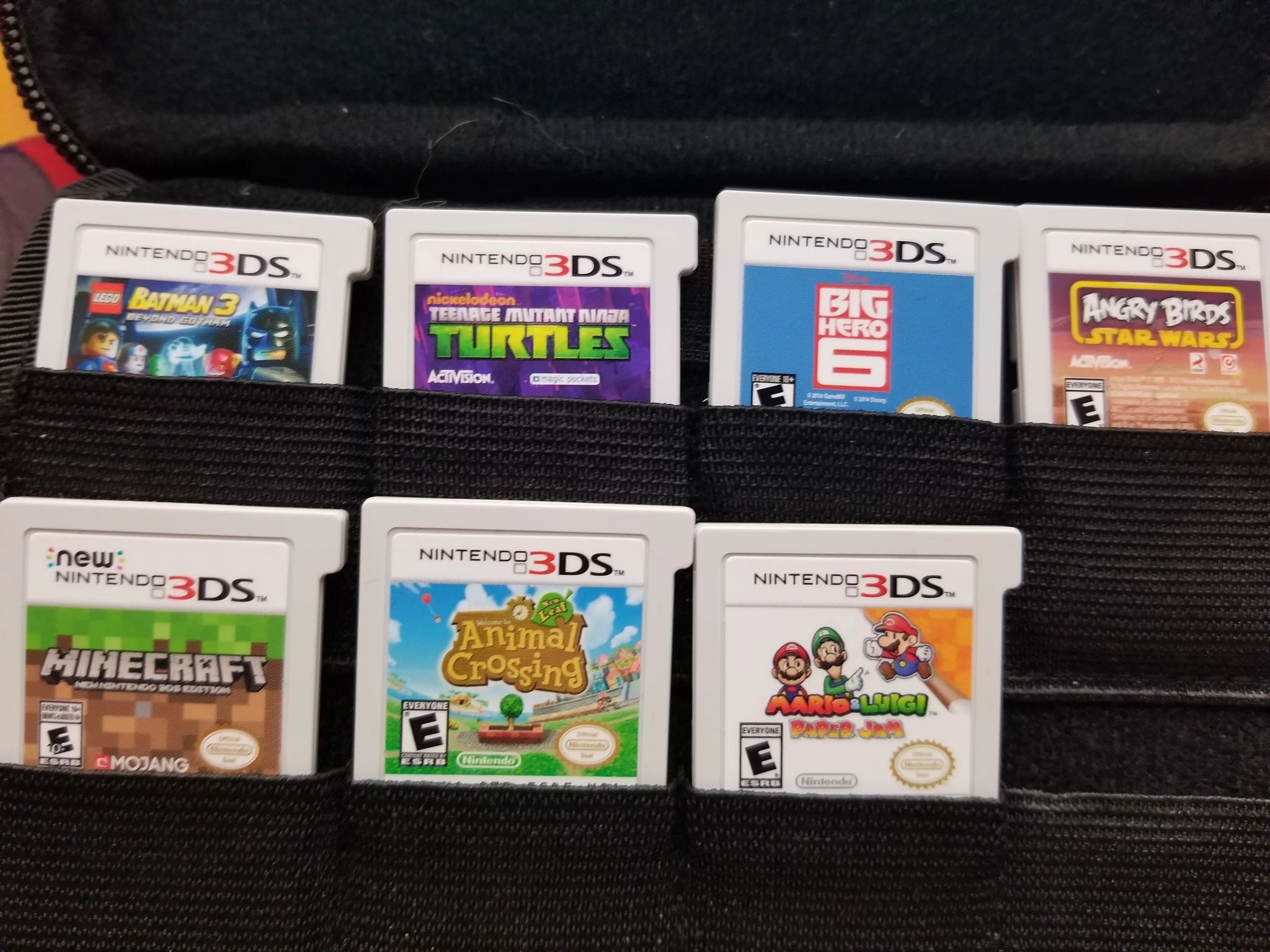 Fully Modded Nintendo New 3DS XL 4GB Handheld Gaming System W carrying case and 200 games installed.