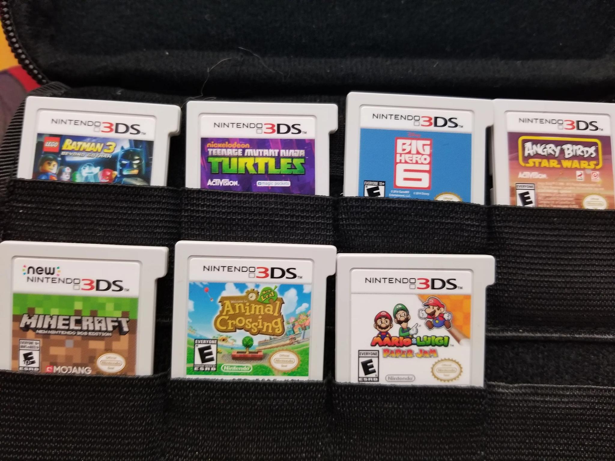 Fully Modded Nintendo New 3DS XL 4GB Handheld Gaming System W carrying case and 200 games installed.
