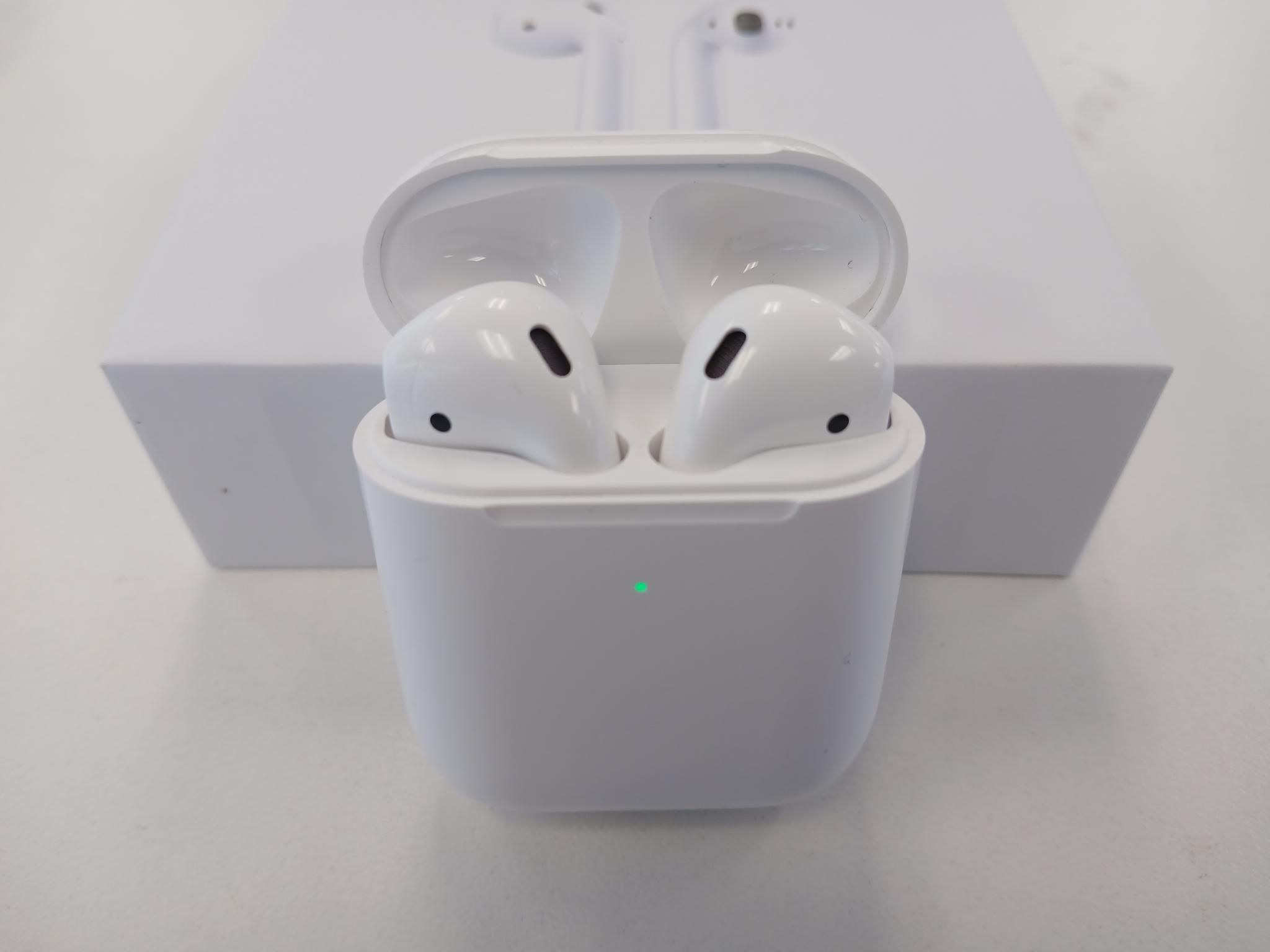 Airpods original packaging, charger and manual
