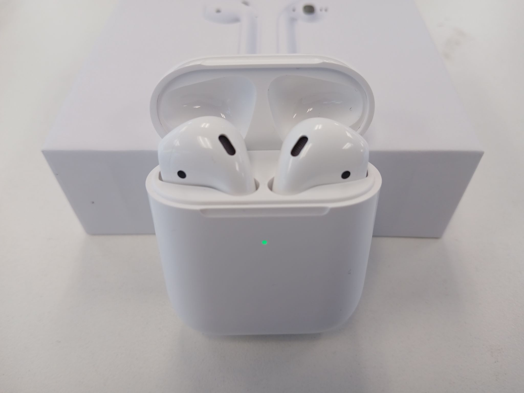 Airpods original packaging, charger and manual
