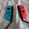 Nintendo Switch with Dock, Charger and controller base with 128GB SD card