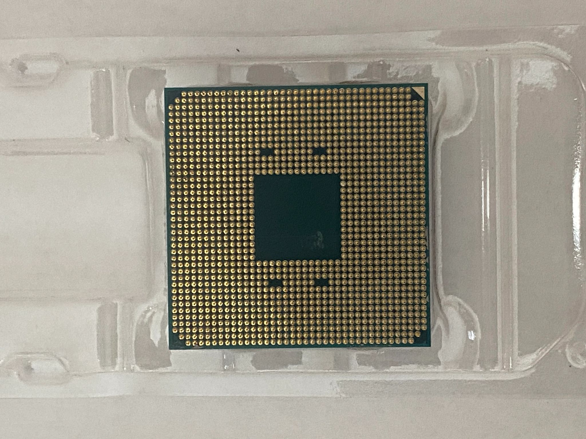 AMD Ryzen 5 3600XT 3.8 GHz 6-Core Processor and AMD Cooler in box.