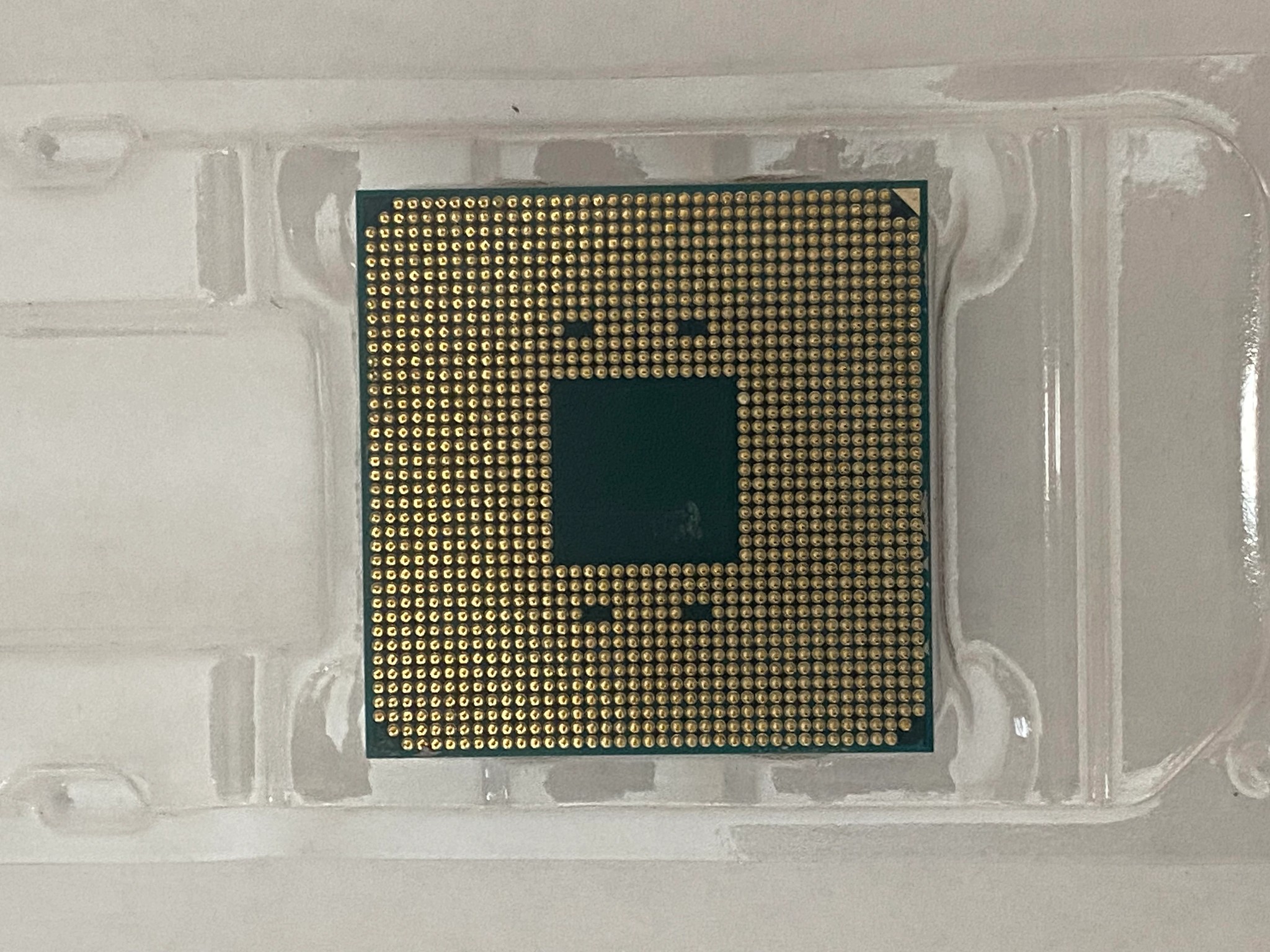 AMD Ryzen 5 3600XT 3.8 GHz 6-Core Processor and AMD Cooler in box.