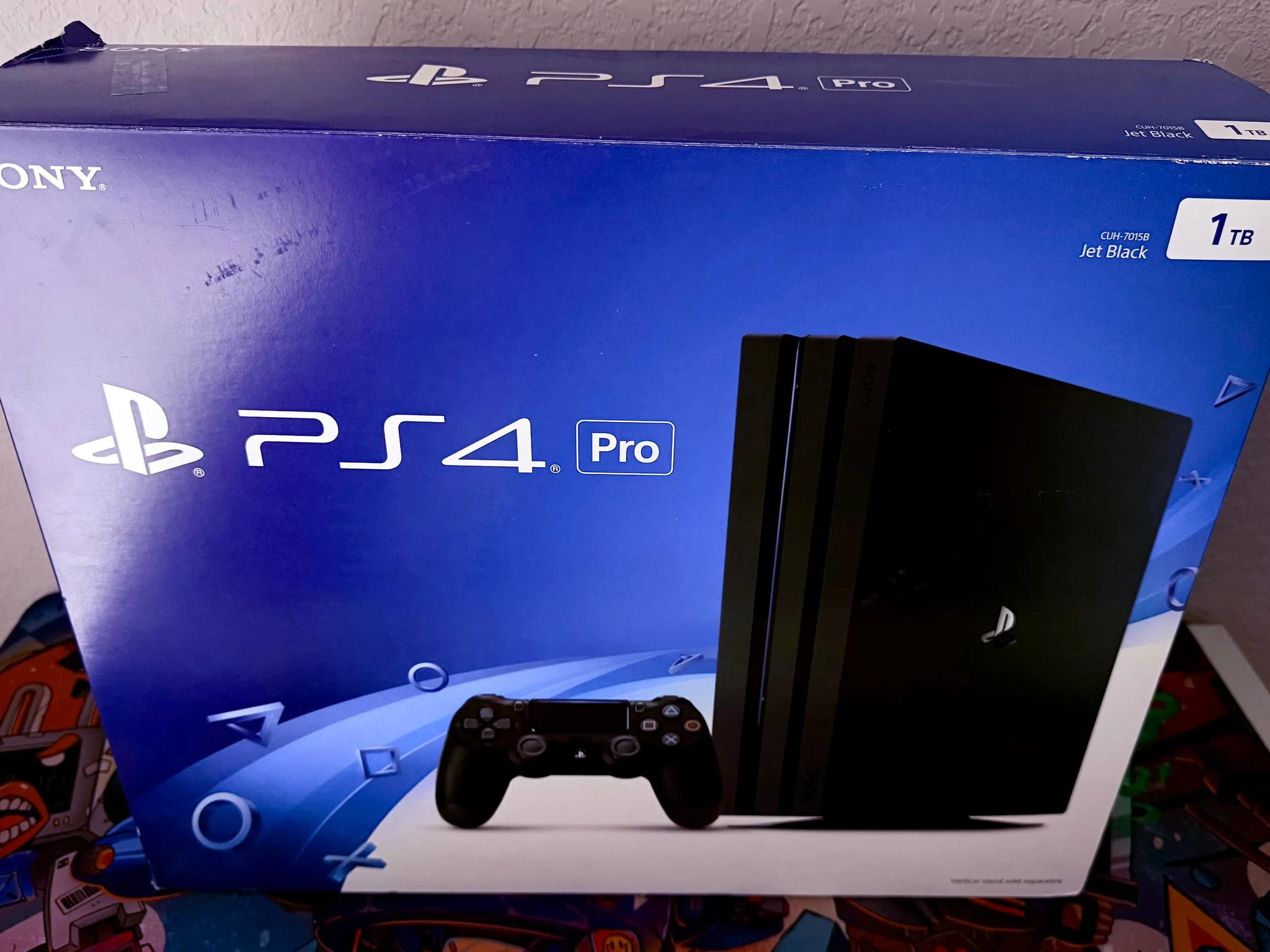 Sony PlayStation 4 Pro 1TB Console (Black) + 7 Games