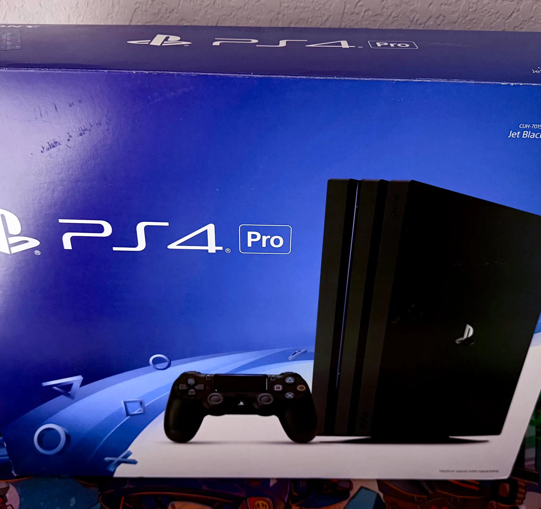Sony PlayStation 4 Pro 1TB Console (Black) + 7 Games