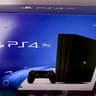 Sony PlayStation 4 Pro 1TB Console (Black) + 7 Games