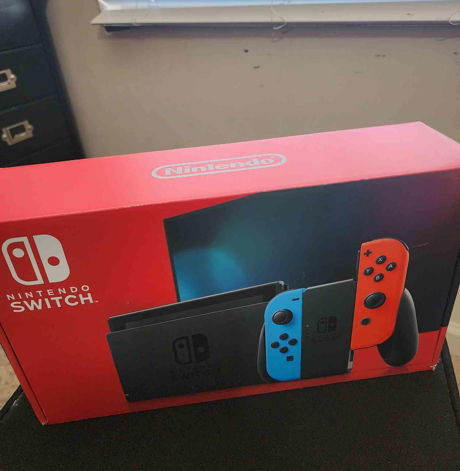 Nintendo Switch Bundle – w/ Box, 200GB SD Card, 3 Games, Case (Bundle)