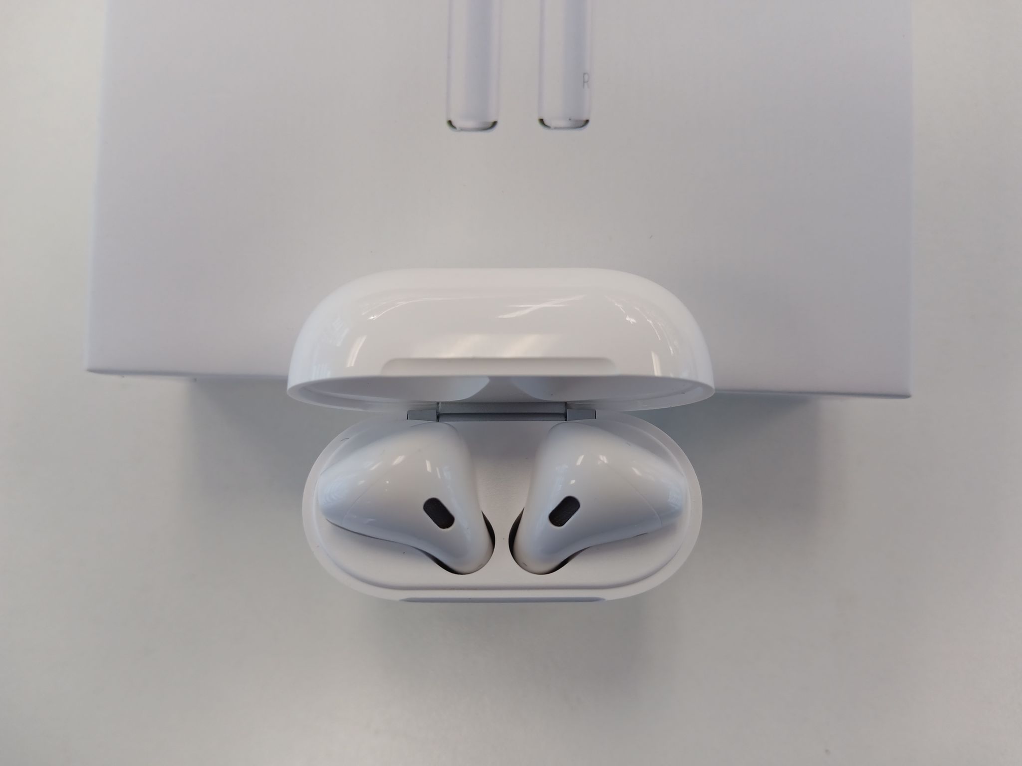 Airpods original packaging, charger and manual