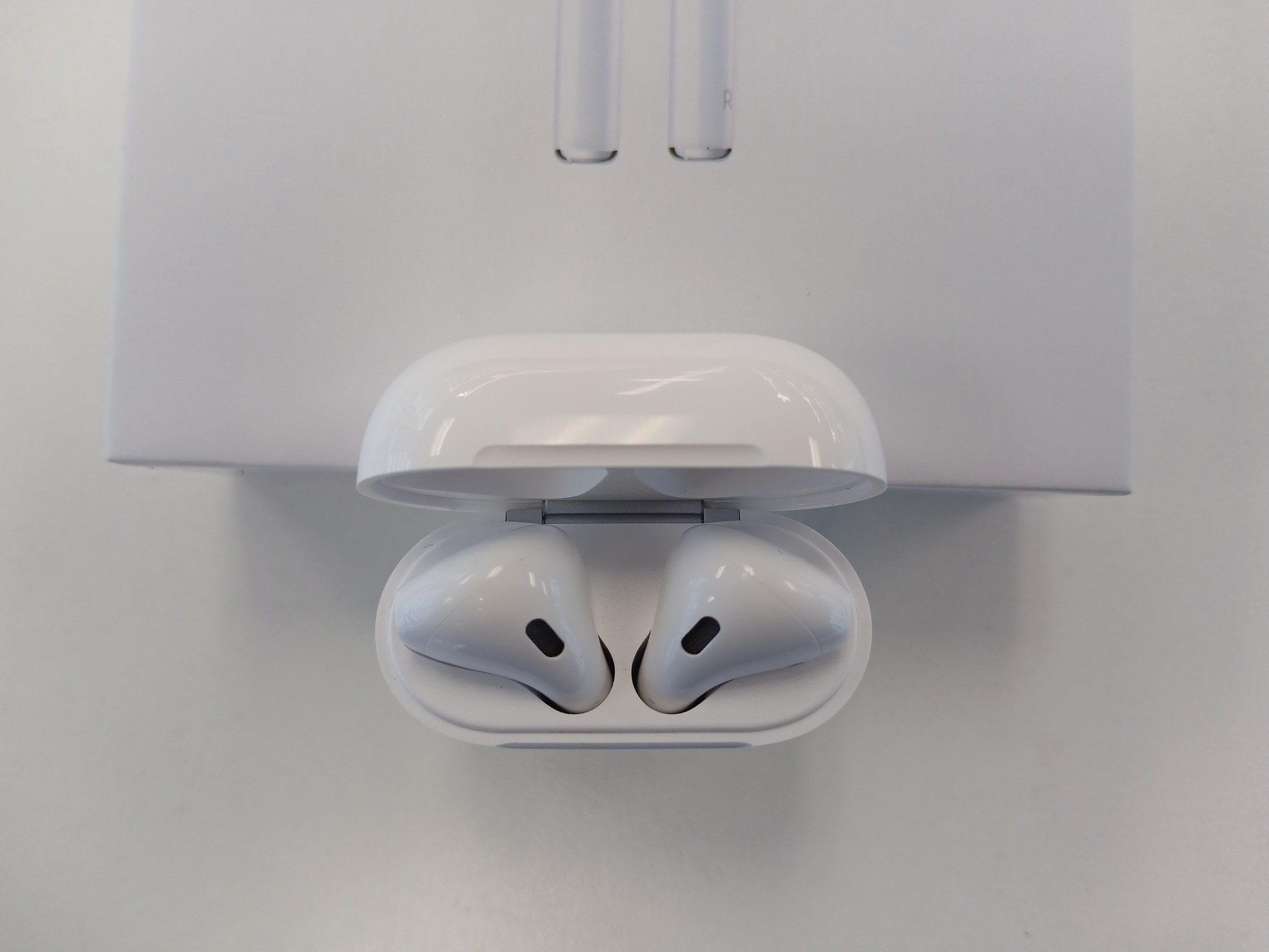 Airpods original packaging, charger and manual